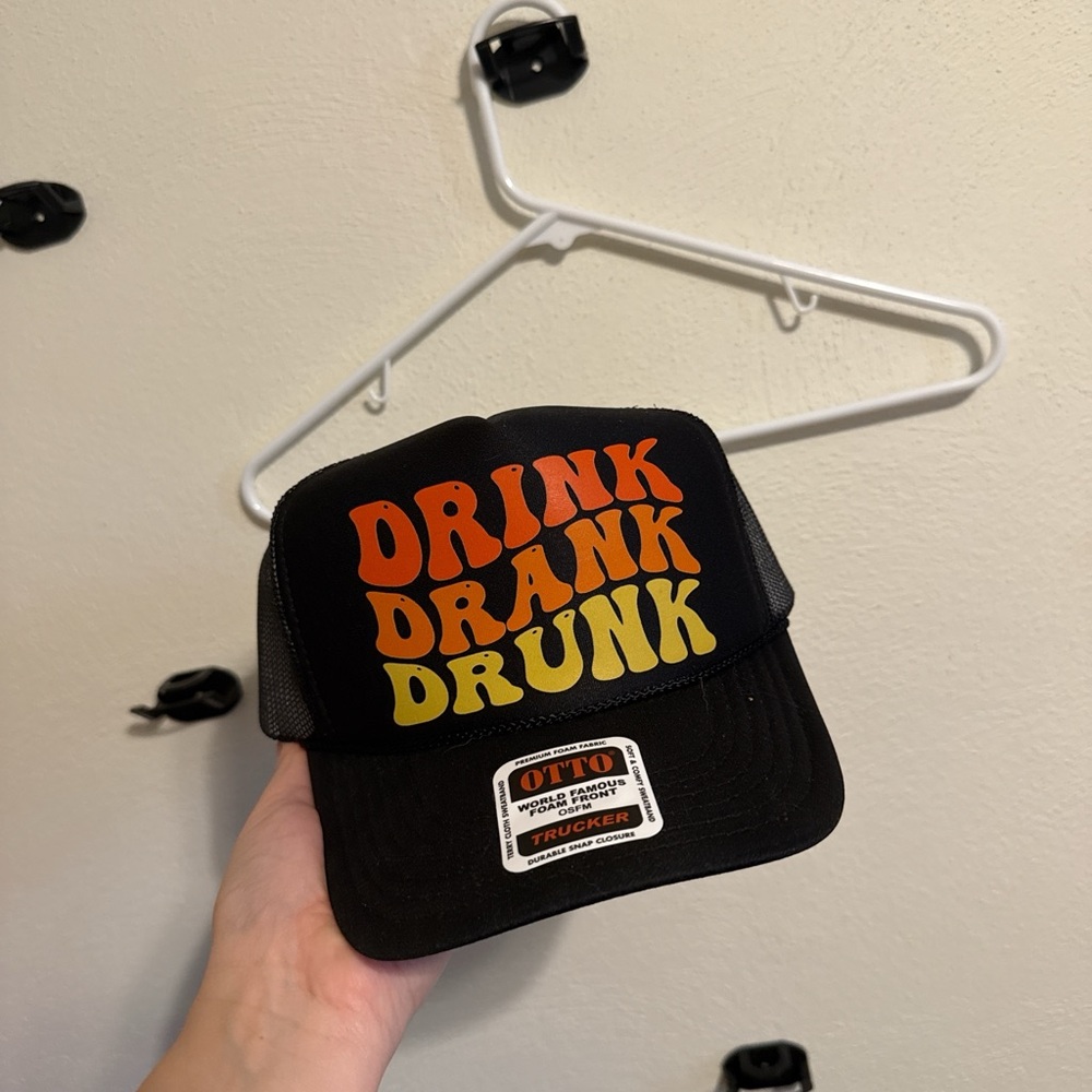 OTTO Black Trucker Hat with Orange and Yellow Text